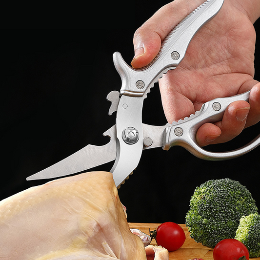 Ciseaux de cuisine multifonctions 🍗 Une lame, plusieurs usages : écailleur à poisson, casse-noix et ouvre-bouteille. Lames dentelées pour une prise en main antidérapante. Verrouillage de sécurité pour éviter les coupures. ✂️
