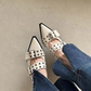 Escarpins à talons bas, œillets et boucles, style rock