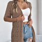 Gilet cardigan à manches courtes et motifs ajourés tricoté pour femme