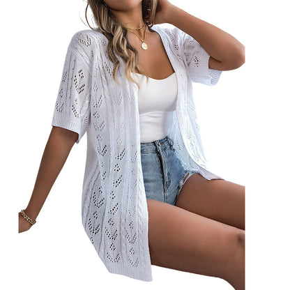Gilet cardigan à manches courtes et motifs ajourés tricoté pour femme