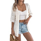 Gilet cardigan à manches courtes et motifs ajourés tricoté pour femme